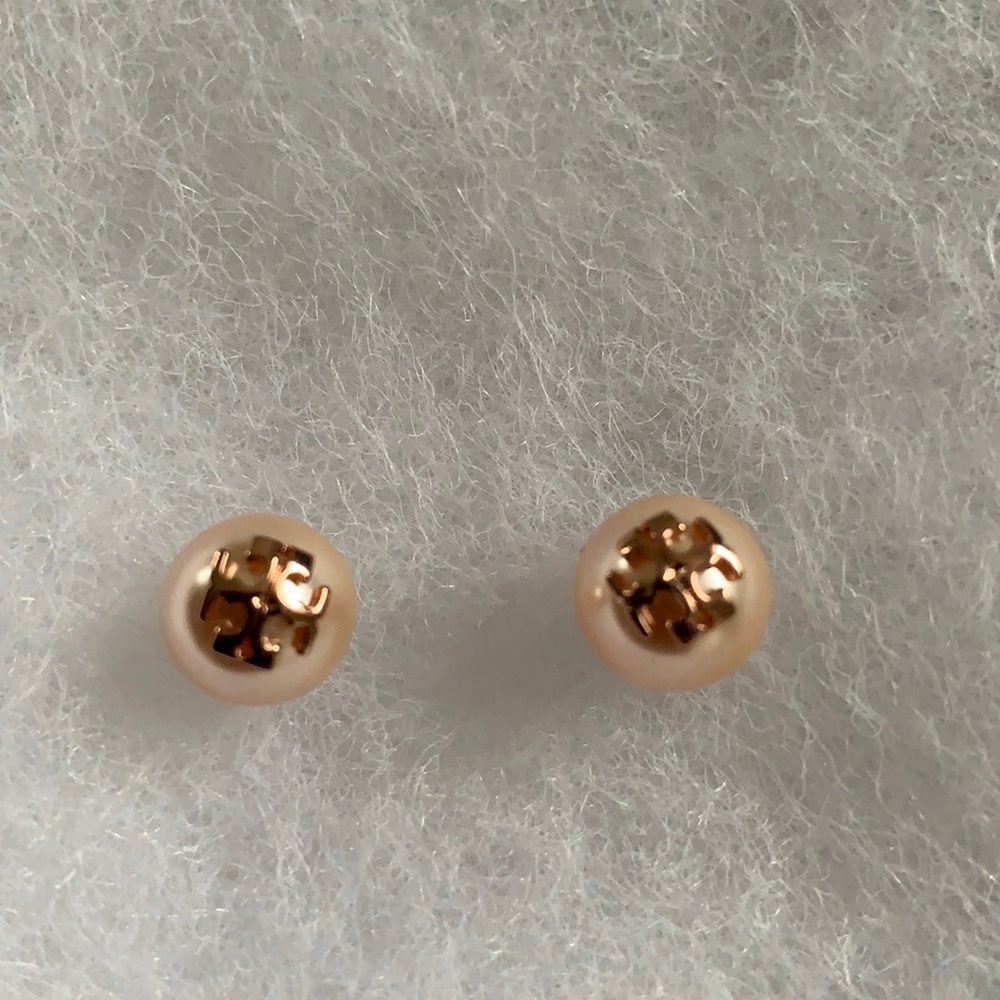 Tory Burch rose gold earnings